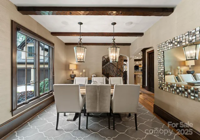 a dining room with furniture and window