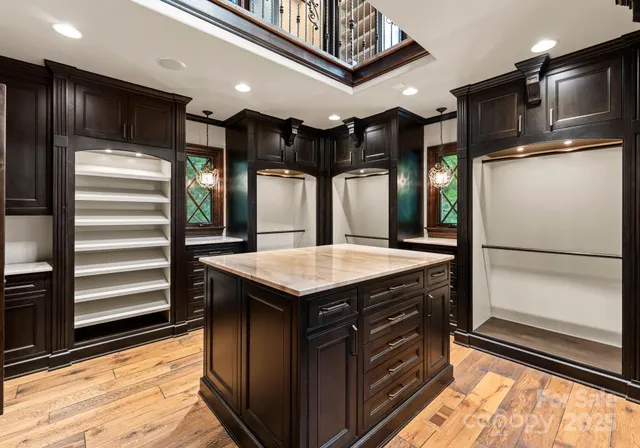 a kitchen with a stove and a refrigerator