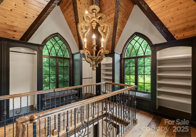 a view of a brick house with a large windows