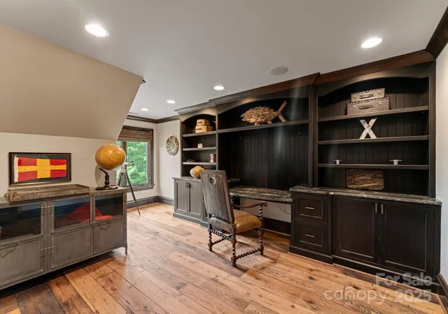 a view of a workspace with furniture