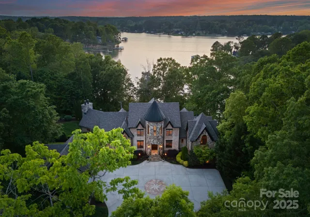 a view of a house with a lake view