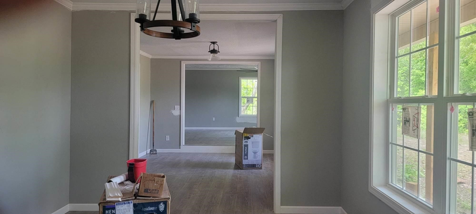 920 Tyler Road Lexington, TN 38351 - Photo 7 of 17 a view of hallway with sink and wooden floor