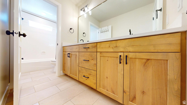 1127 4240 North Enoch, UT 84721 - Photo 43 of 56 Bathroom with double vanity and light tile patterned floors