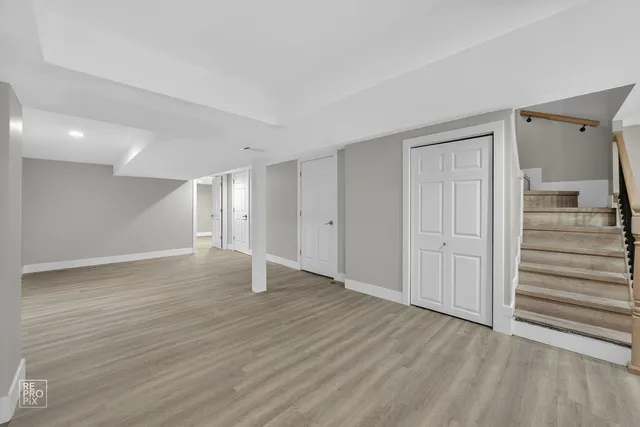 a view of a livingroom with wooden floor