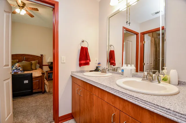 a bathroom with a sink shower