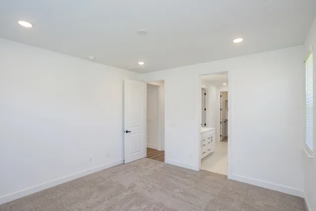a bathroom with a double vanity sink mirror and double