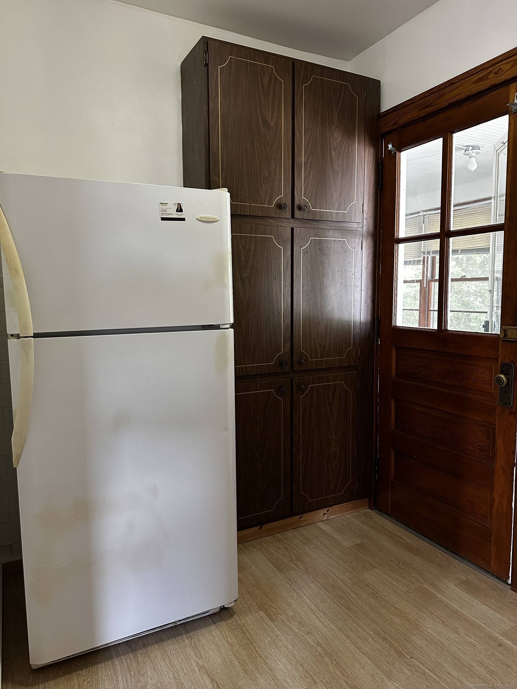 20 Amaryllis Avenue Waterbury, CT 06710 - Photo 19 of 21 a close view of a refrigerator in kitchen and a refrigerator