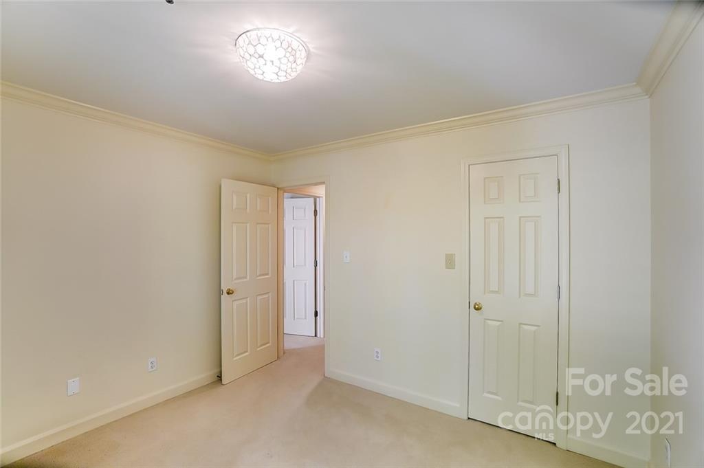 416 Queens Road, Unit 14 Charlotte, NC 28207 - Photo 16 of 27 a view of an empty room