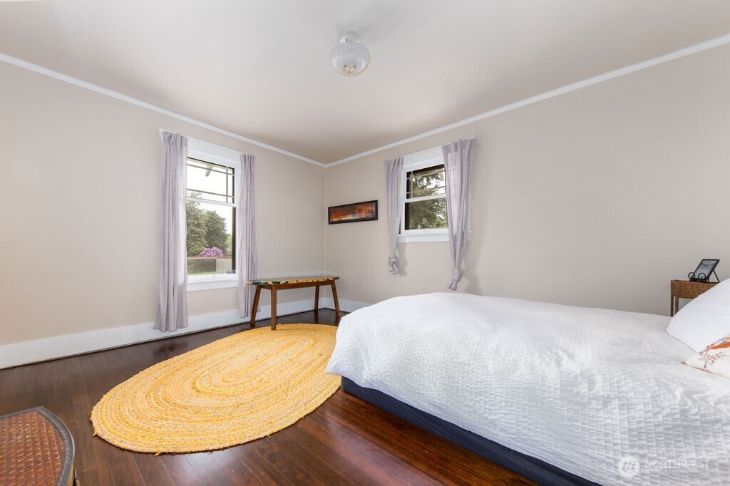 1206 North 2nd Street Renton, WA 98057 - Photo 12 of 24 a bedroom with a bed and a window