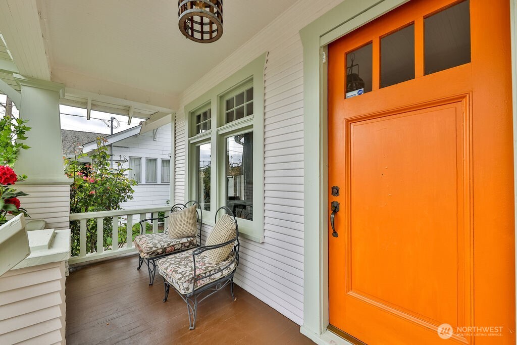 1206 North 2nd Street Renton, WA 98057 - Photo 2 of 24 a living room with furniture and a potted plant