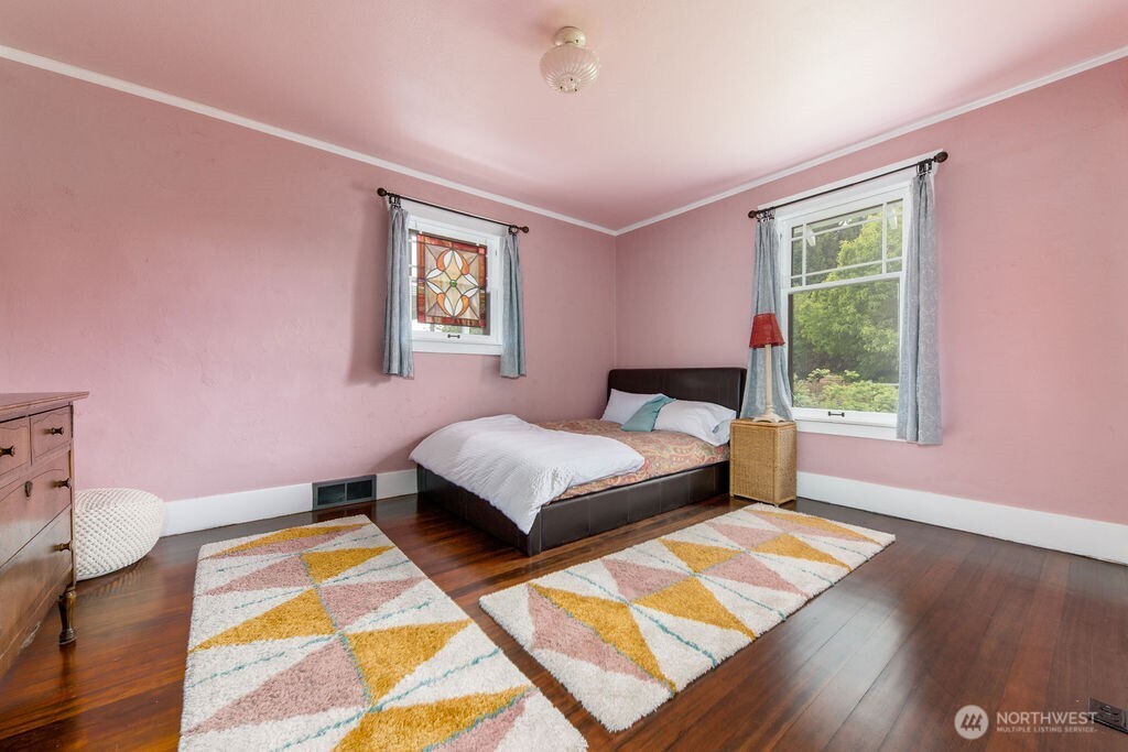 1206 North 2nd Street Renton, WA 98057 - Photo 9 of 24 a bedroom with a bed and a window