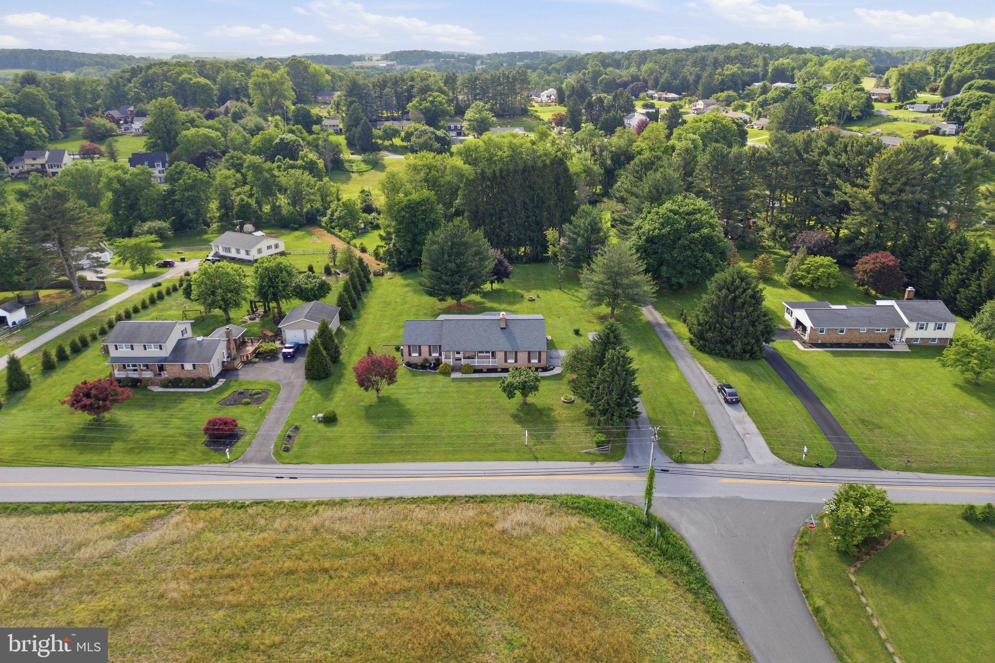 18310 Upper Beckleysville Road Hampstead, MD 21074 - Photo 64 of 67 Scenic suburban homes amidst lush greenery.