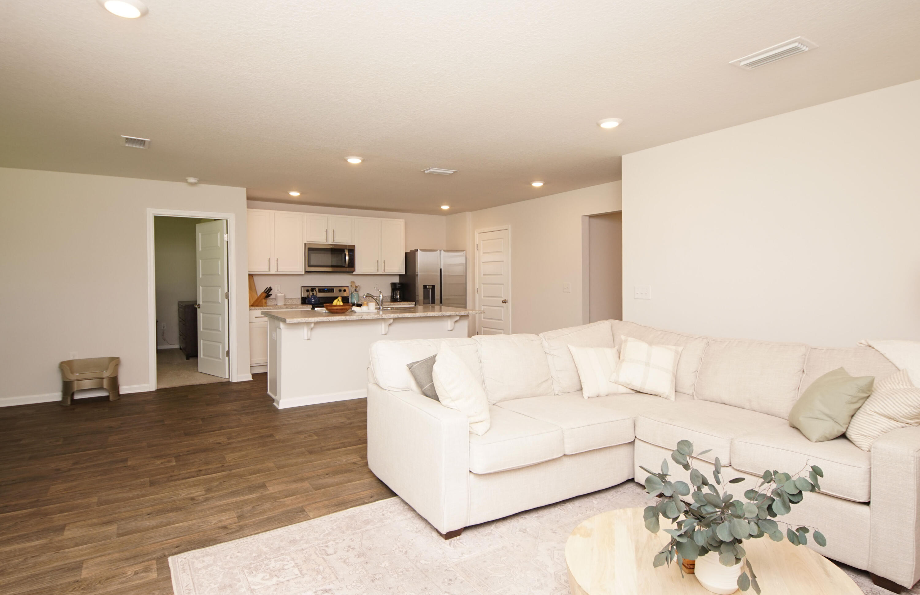 334 This Way Freeport, FL 32439 - Photo 21 of 55 a living room with furniture and kitchen view