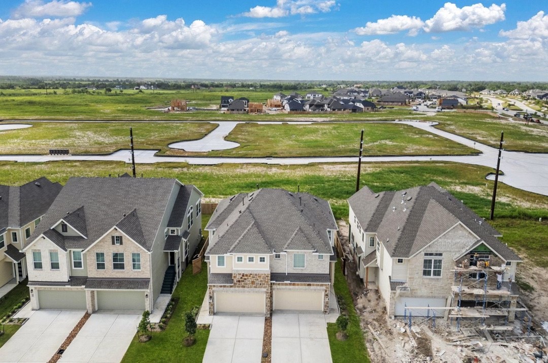 5234 Capricorn Way Manvel, TX 77578 - Photo 3 of 25 a view of a city from a terrace