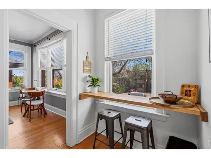 a room with furniture and a window