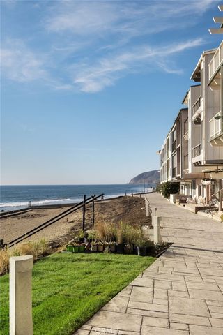 a view of a terrace with yard