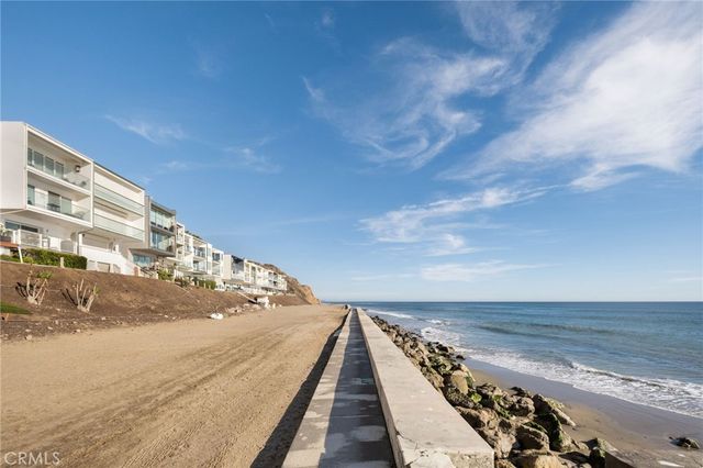 a view of balcony with ocean view