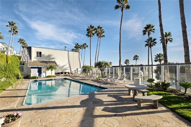 a view of a house with a swimming pool