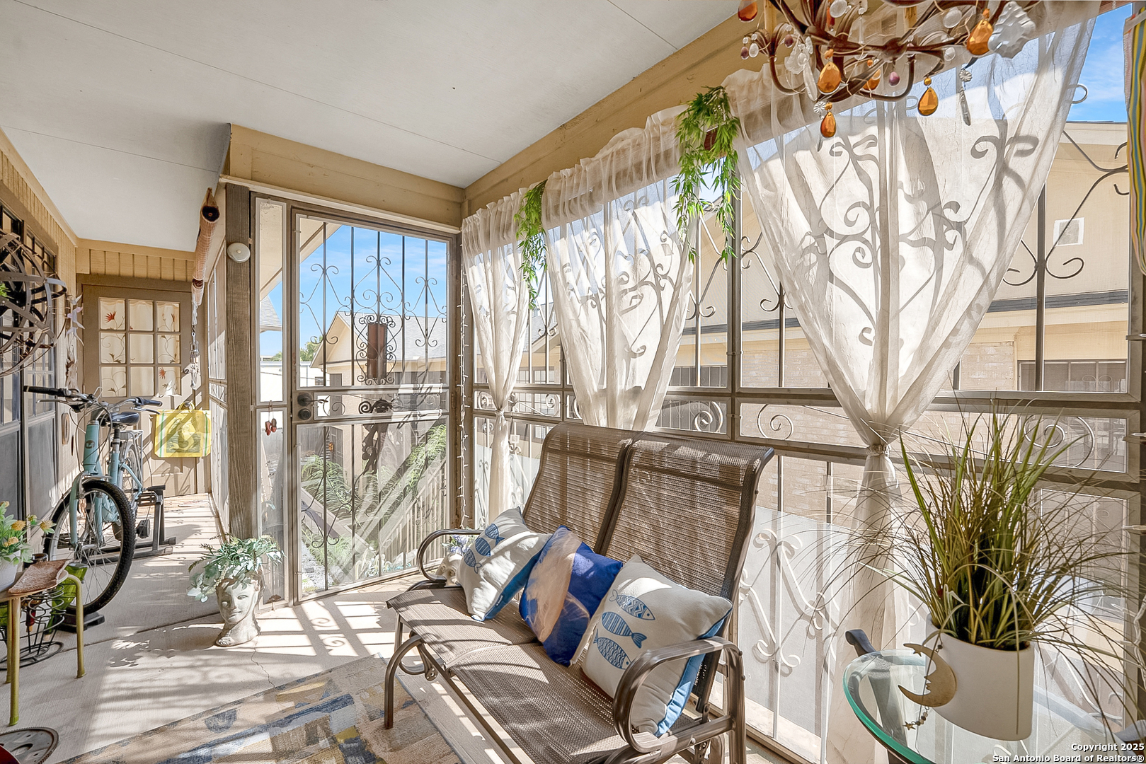 165 West Rampart Drive, Unit 706 San Antonio, TX 78216 - Photo 8 of 20 a living room with furniture and a floor to ceiling window