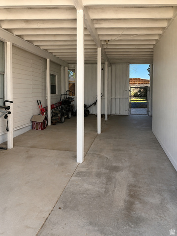 655 Molen Road Ferron, UT 84523 - Photo 2 of 18 Covered patio with exposed beam ceiling, concrete flooring, and direct exterior access