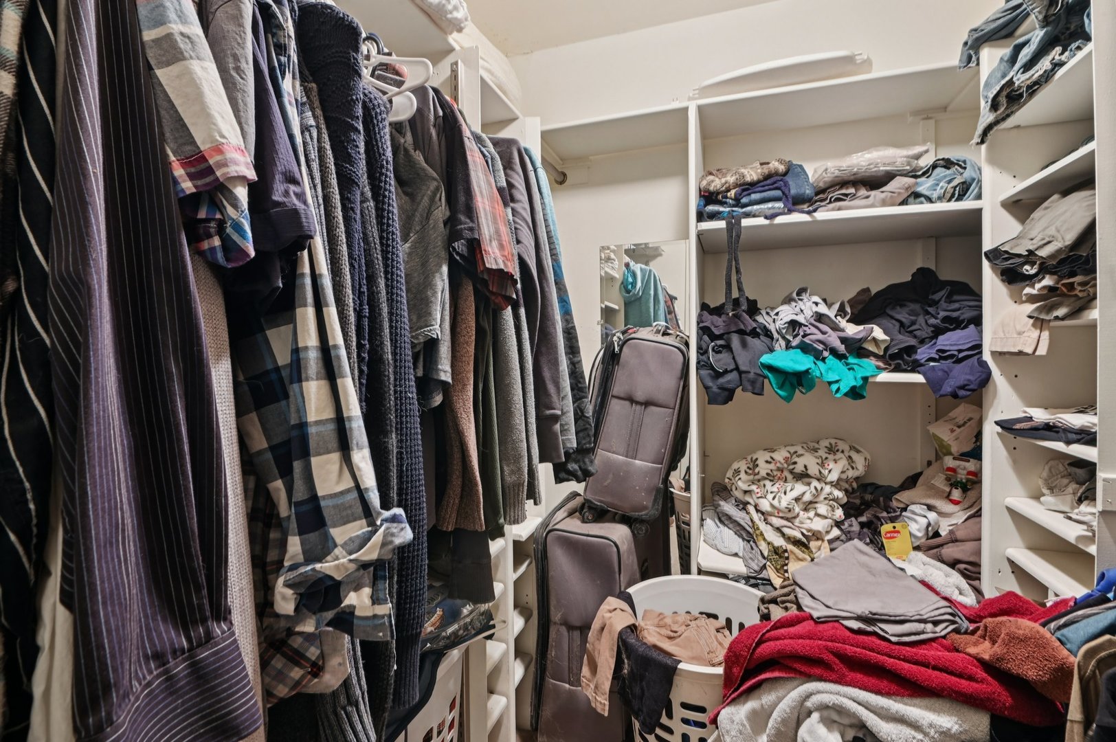 7605 Banks Street Justice, IL 60458 - Photo 16 of 47 a view of walk in closet with clothes and shoes