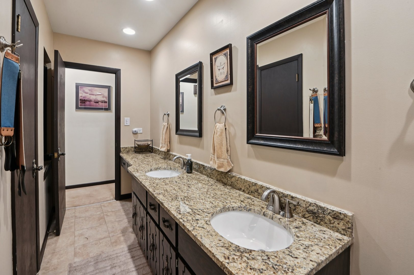 7605 Banks Street Justice, IL 60458 - Photo 21 of 47 a bathroom with a granite countertop sink and a mirror