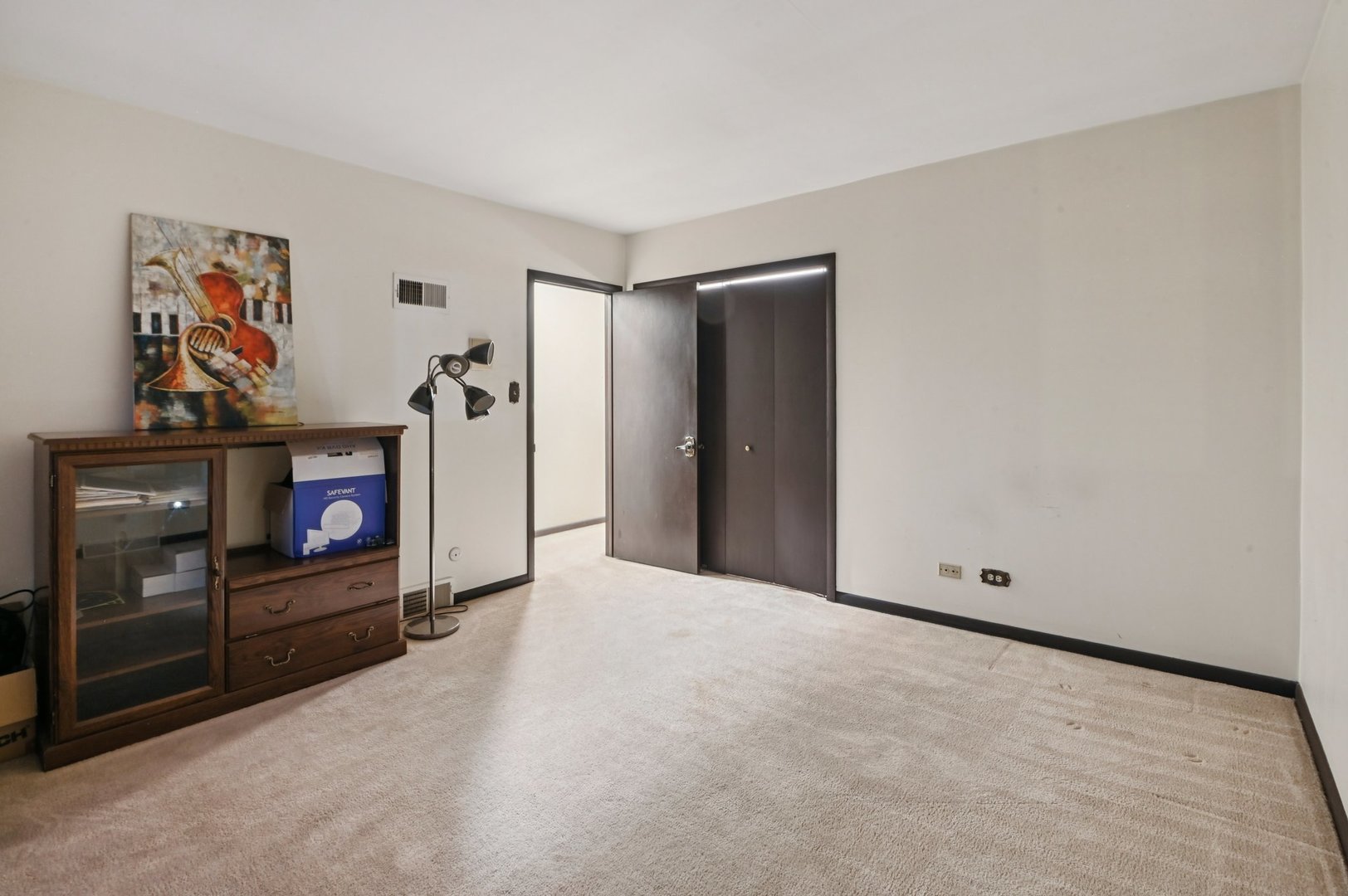 7605 Banks Street Justice, IL 60458 - Photo 23 of 47 a view of an empty room with painting on the wall