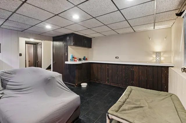 a bathroom with a sink and mirror