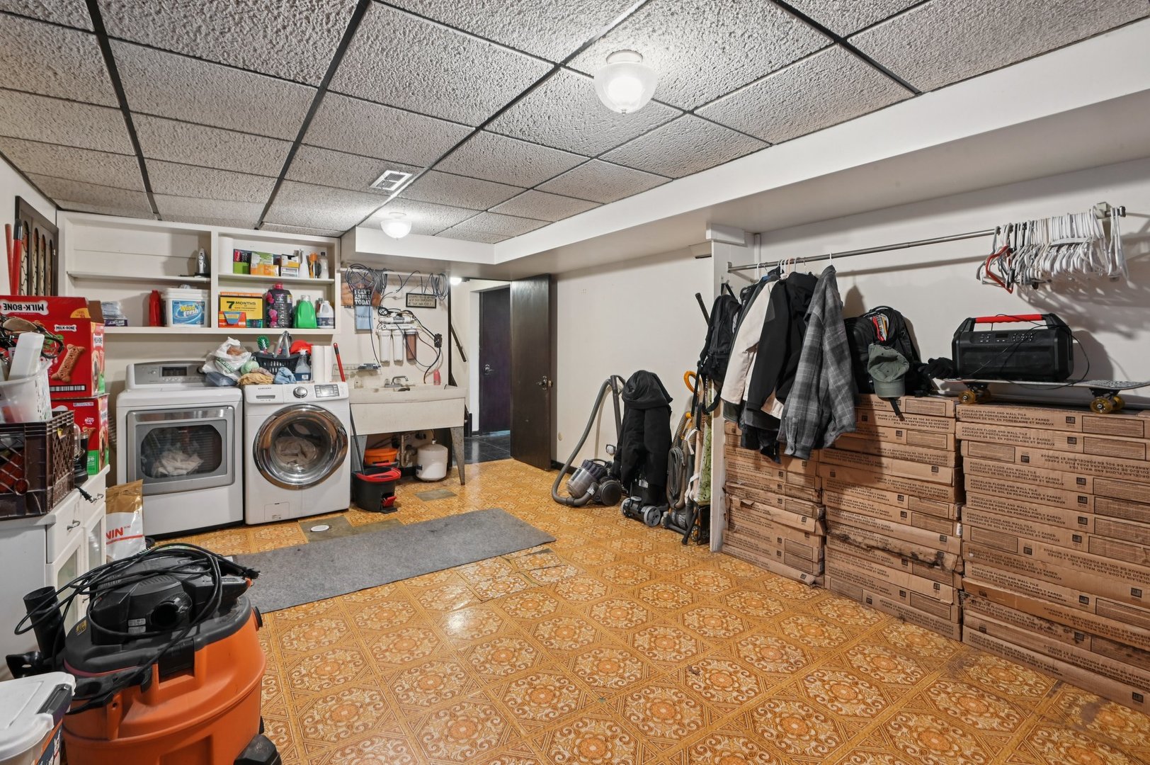 7605 Banks Street Justice, IL 60458 - Photo 31 of 47 a view of walk in closet with clothes and shoes