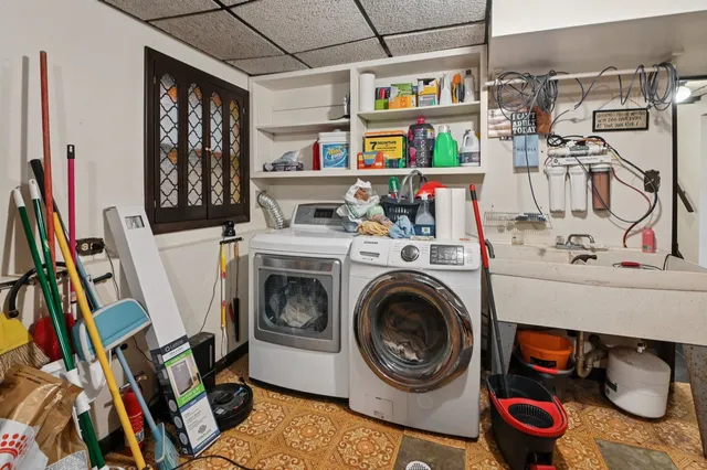a utility room with dryer and washer
