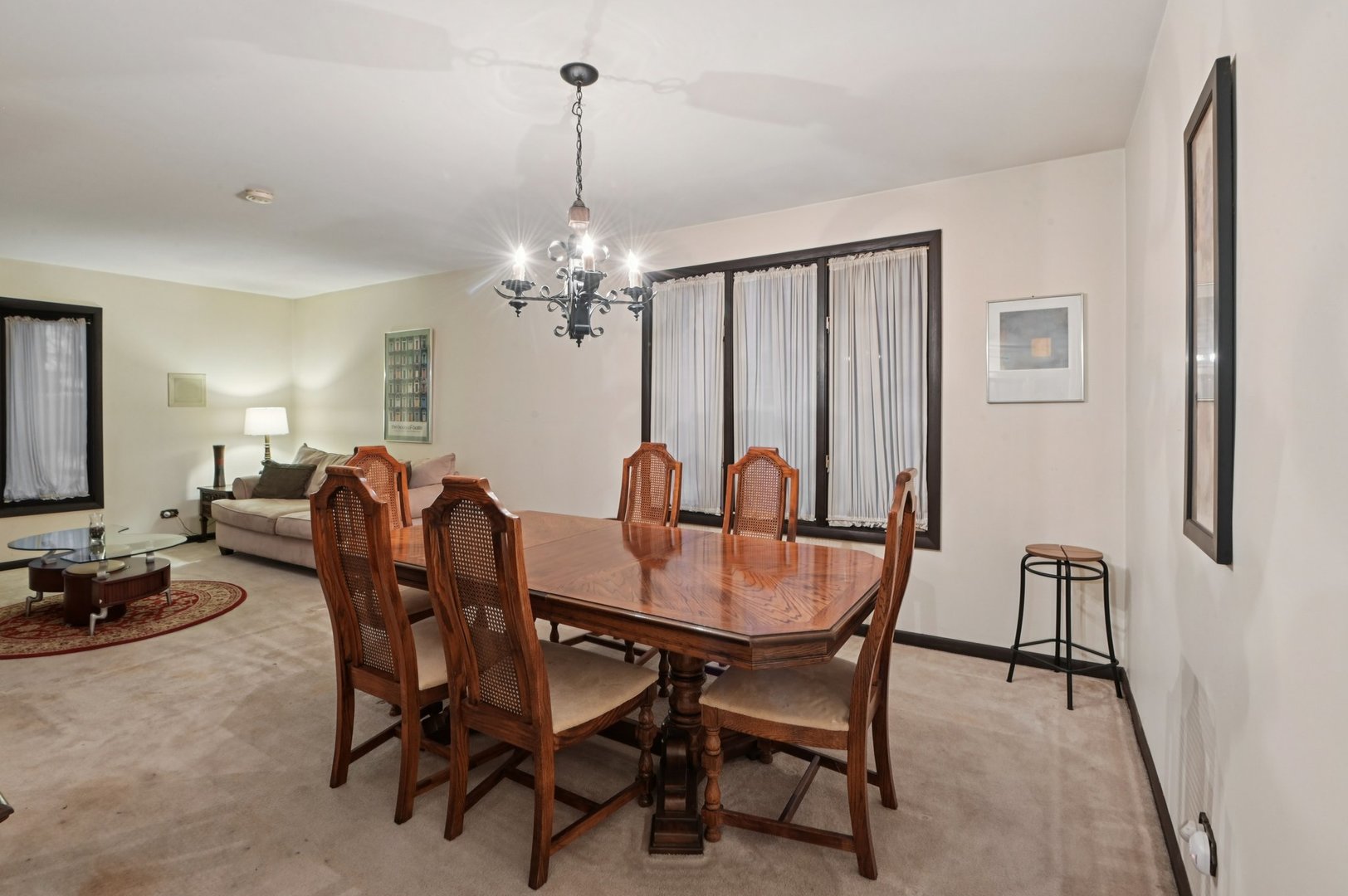 7605 Banks Street Justice, IL 60458 - Photo 8 of 47 a view of a dining room with furniture and chandelier