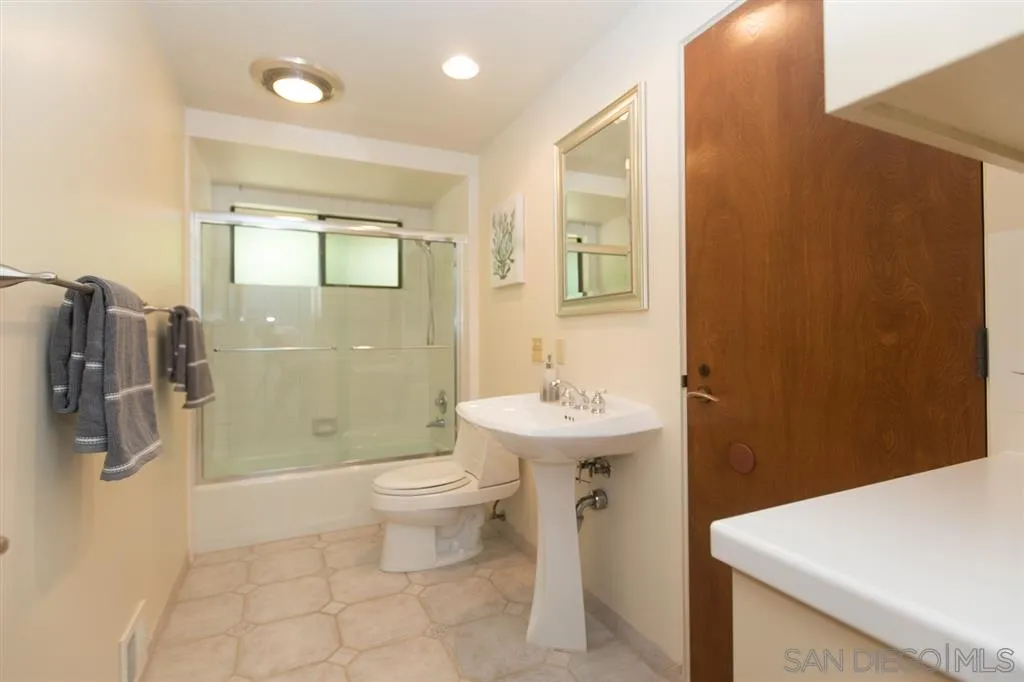 1211 Palomino Road Fallbrook, CA 92028 - Photo 17 of 25 a bathroom with a sink a toilet and shower