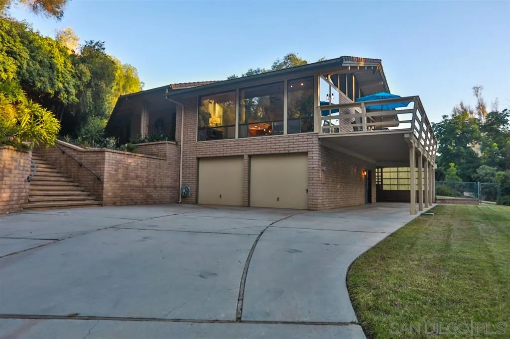 1211 Palomino Road Fallbrook, CA 92028 - Photo 2 of 25 a view of a two chairs in the patio