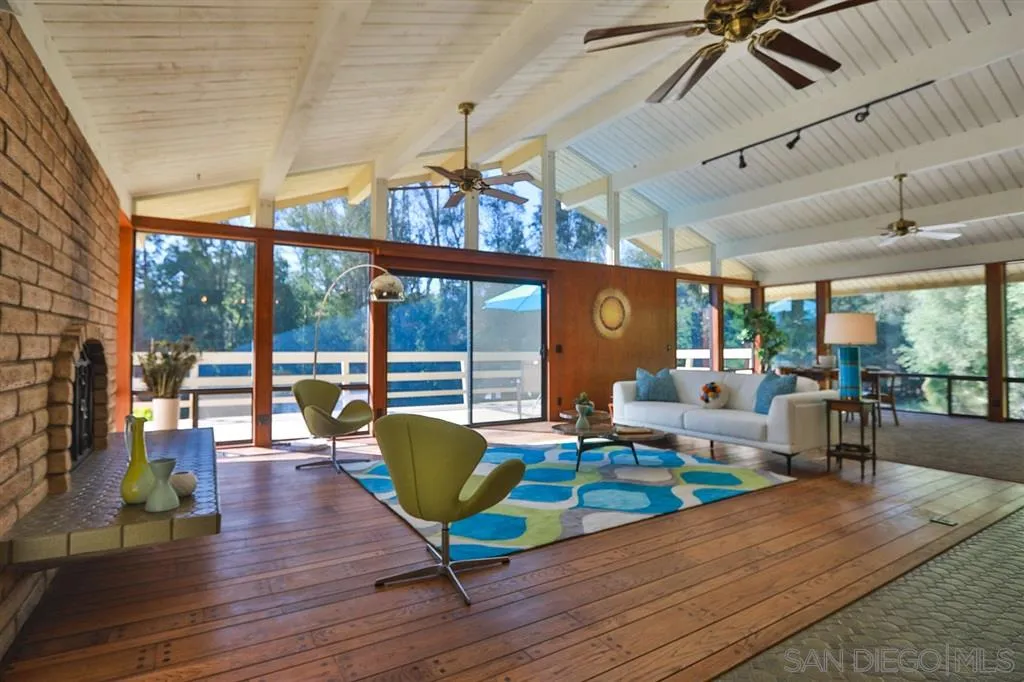 1211 Palomino Road Fallbrook, CA 92028 - Photo 10 of 25 a living room with furniture and a large window