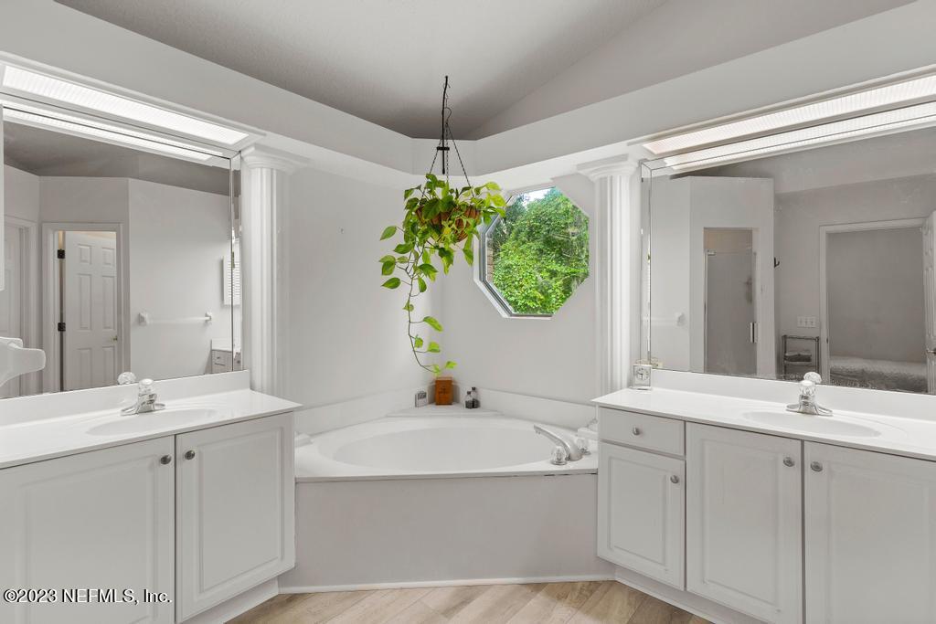 691 Nottingham Forest Circle St. Johns, FL 32259 - Photo 22 of 44 a bathroom with a sink and a mirror