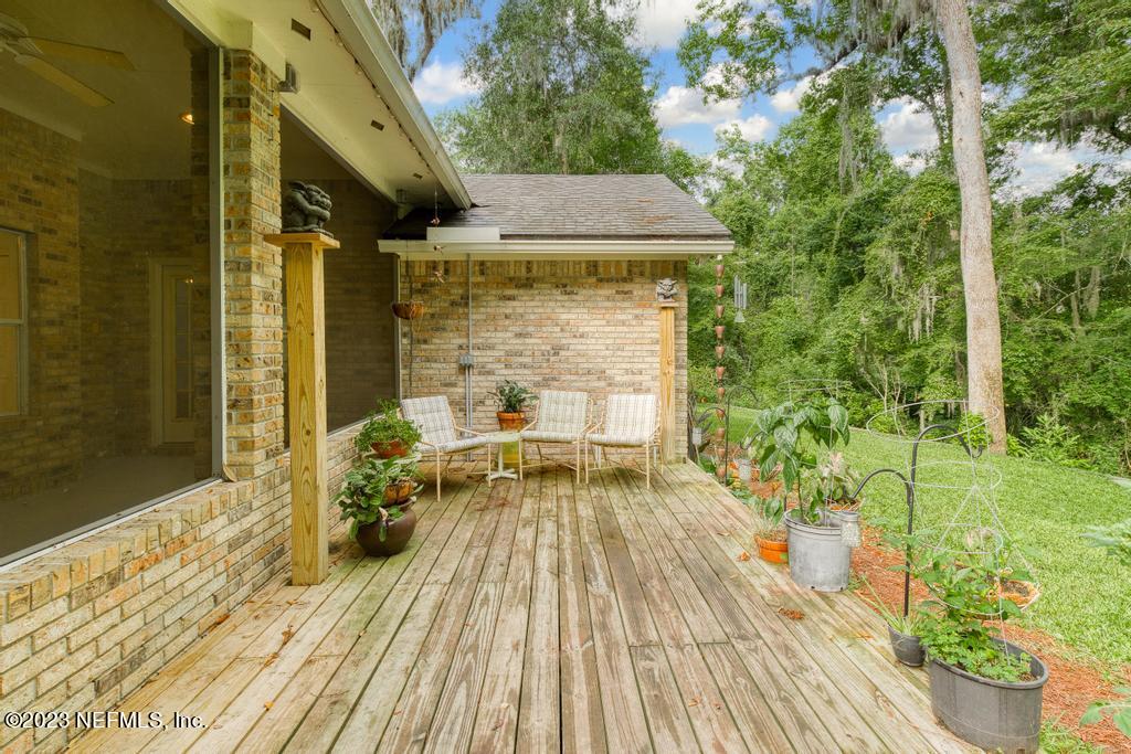 691 Nottingham Forest Circle St. Johns, FL 32259 - Photo 31 of 44 a view of outdoor space with seating area