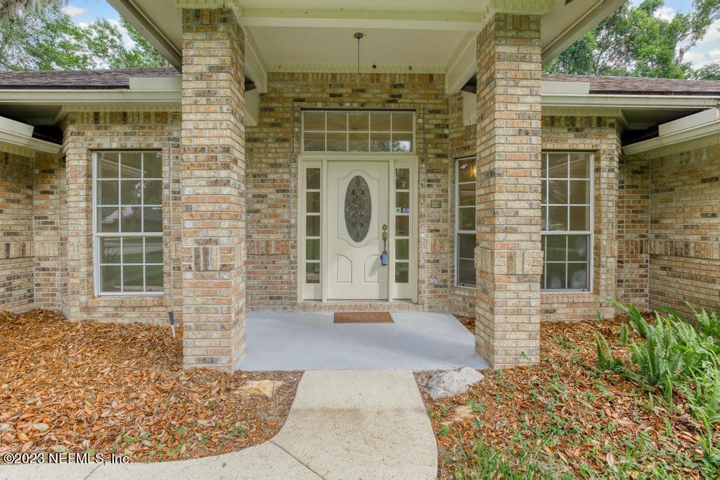 691 Nottingham Forest Circle St. Johns, FL 32259 - Photo 4 of 44 a view of a entryway with a fountain