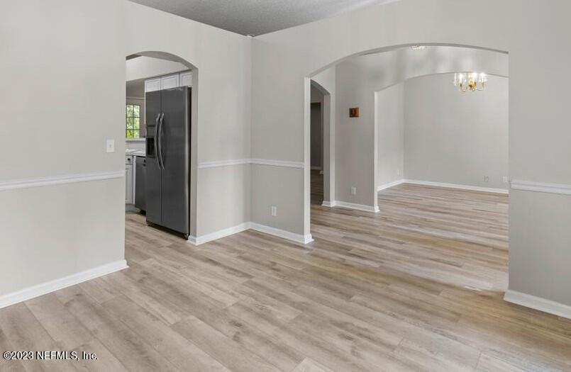 691 Nottingham Forest Circle St. Johns, FL 32259 - Photo 8 of 44 an empty room with wooden floor and closet