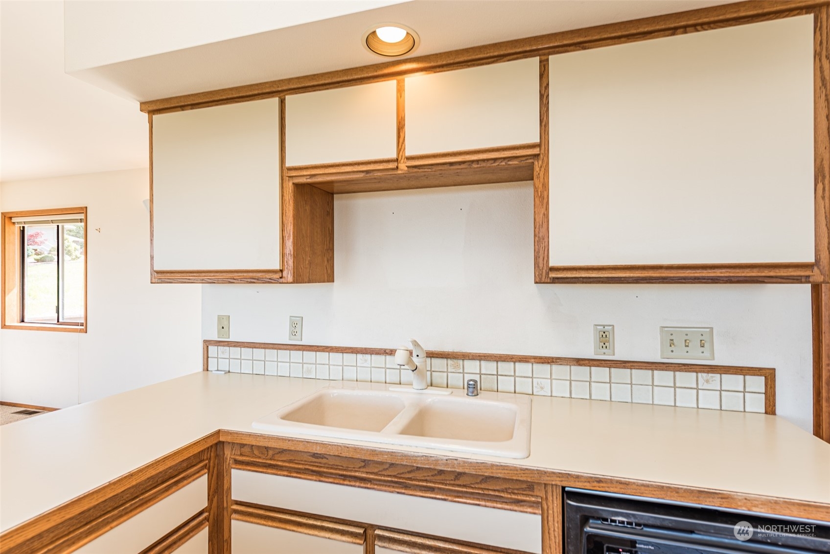 773 Ravens Ridge Road Sequim, WA 98382 - Photo 18 of 38 a bathroom with a sink and a mirror