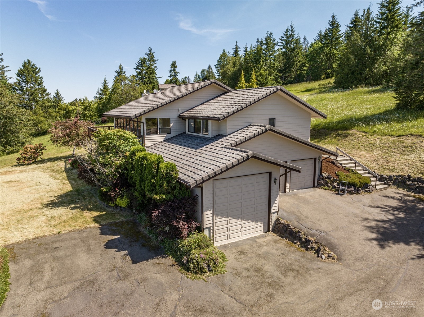 773 Ravens Ridge Road Sequim, WA 98382 - Photo 2 of 38 front view of a house with a yard