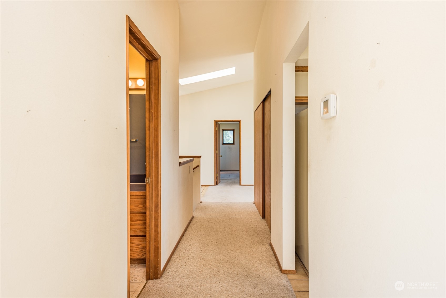 773 Ravens Ridge Road Sequim, WA 98382 - Photo 21 of 38 a view of a bathroom from a hallway