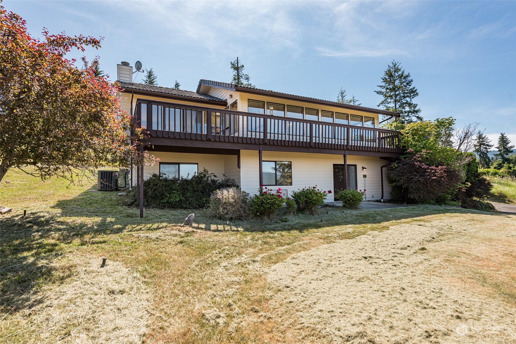 773 Ravens Ridge Road Sequim, WA 98382 - Photo 36 of 38 a front view of a house with a yard