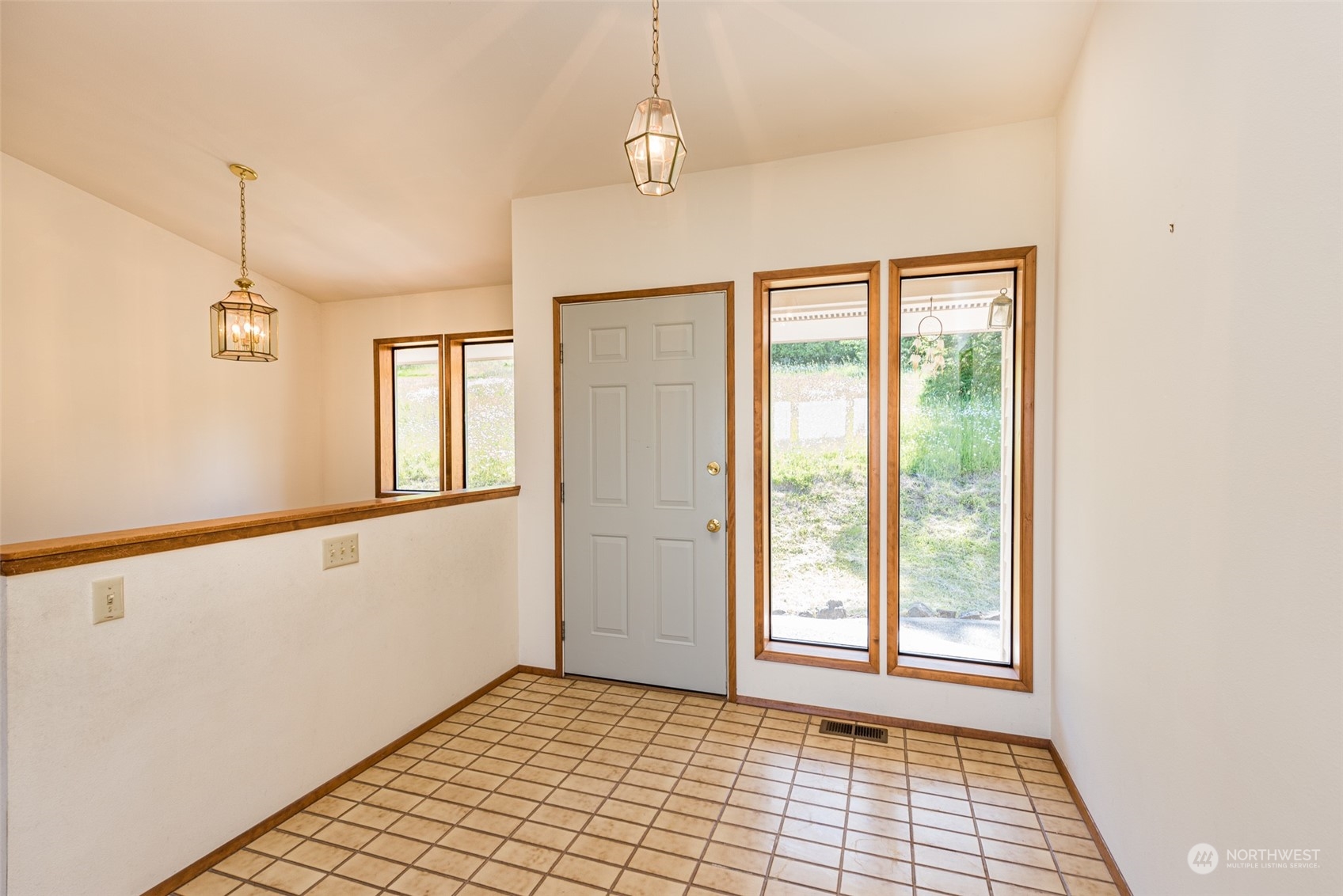 773 Ravens Ridge Road Sequim, WA 98382 - Photo 4 of 38 a view of an empty room with a window