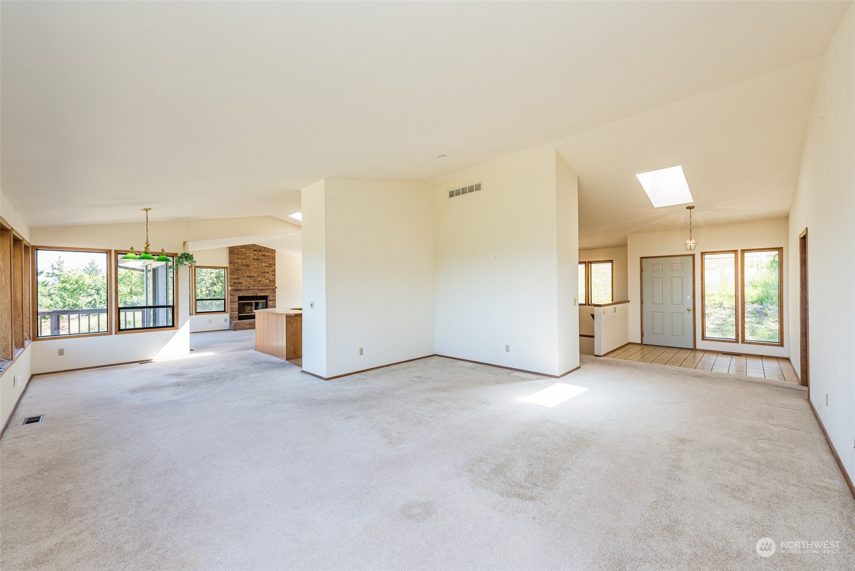 773 Ravens Ridge Road Sequim, WA 98382 - Photo 5 of 38 a view of an empty room with a window