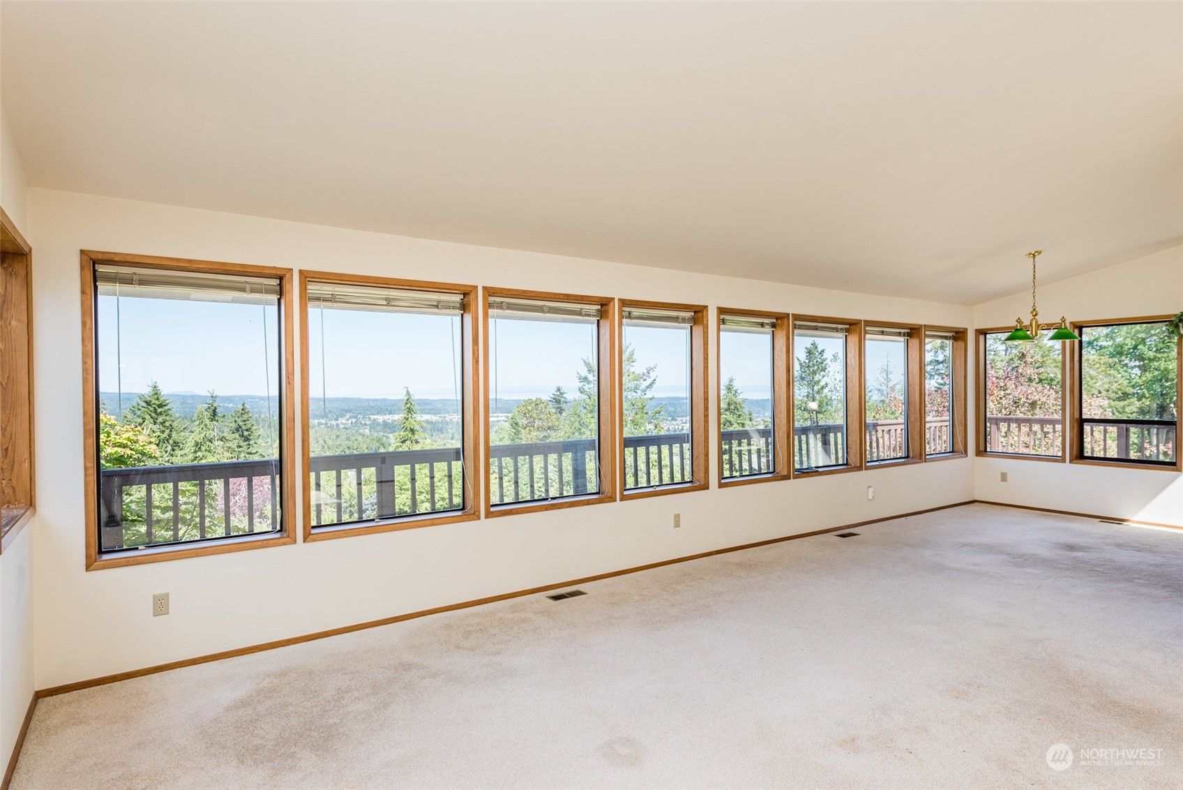 773 Ravens Ridge Road Sequim, WA 98382 - Photo 6 of 38 a view of an empty room with a large window