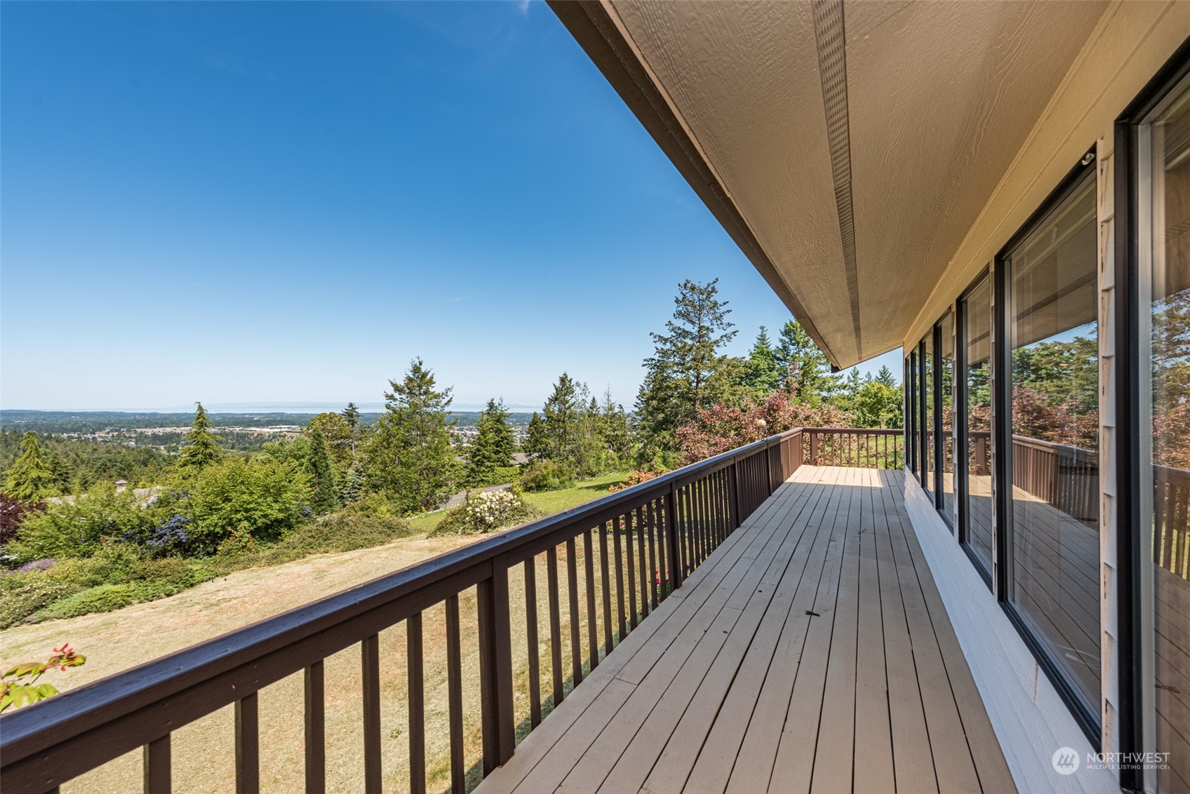 773 Ravens Ridge Road Sequim, WA 98382 - Photo 7 of 38 a view of a balcony with wooden floor