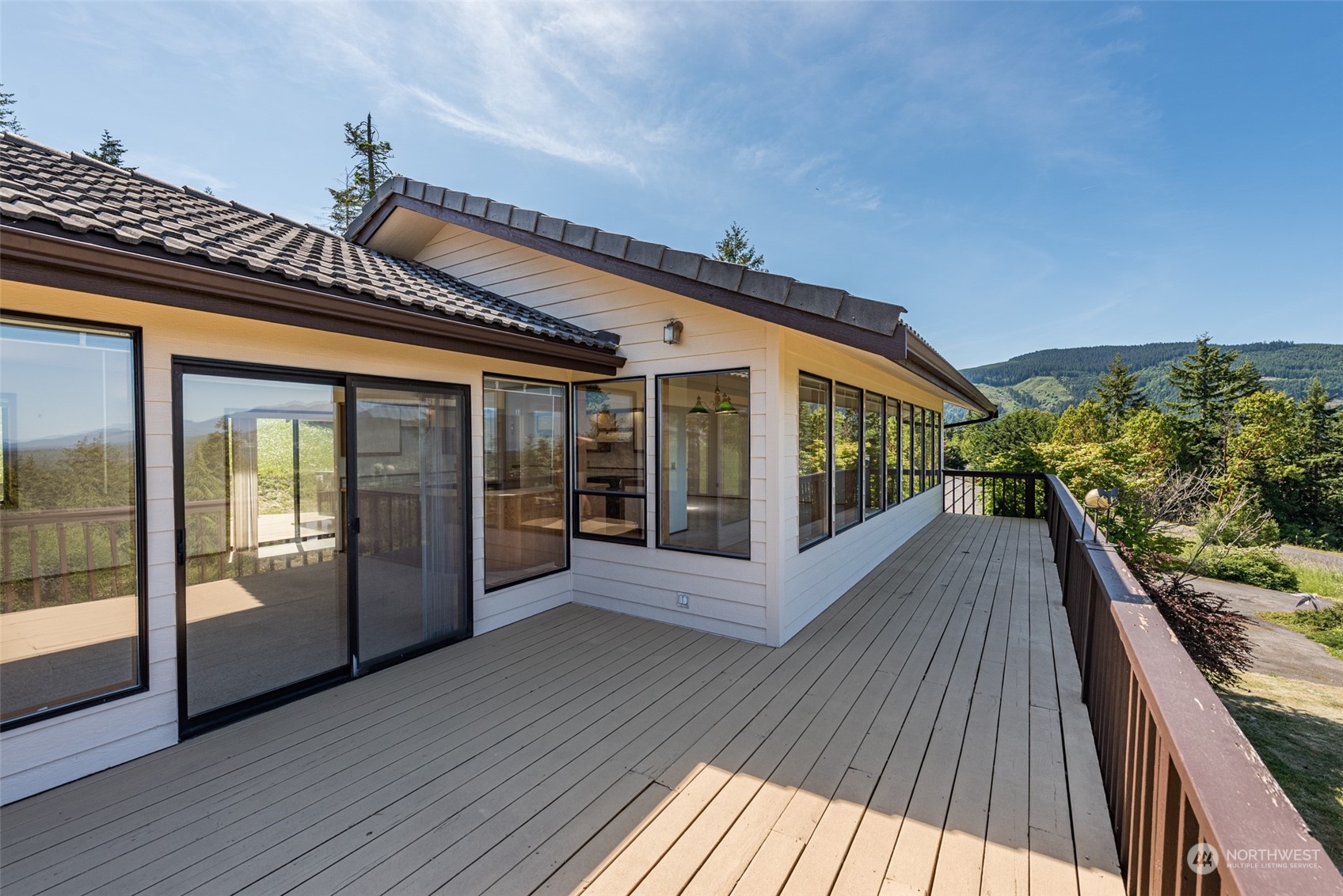 773 Ravens Ridge Road Sequim, WA 98382 - Photo 8 of 38 a view of a house with a balcony