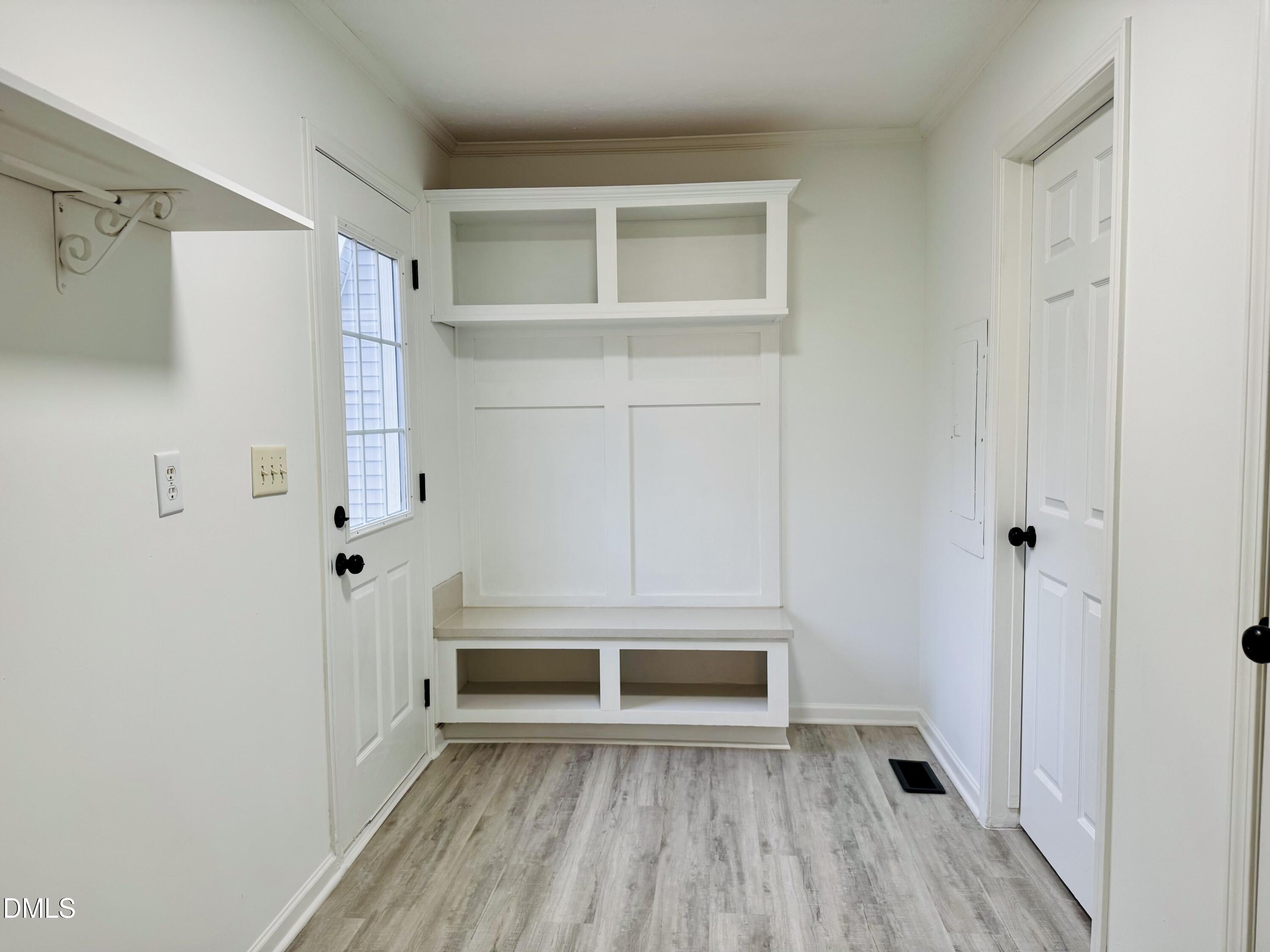 73 Christys Way Roxboro, NC 27574 - Photo 8 of 13 a view of walk in closet with empty racks