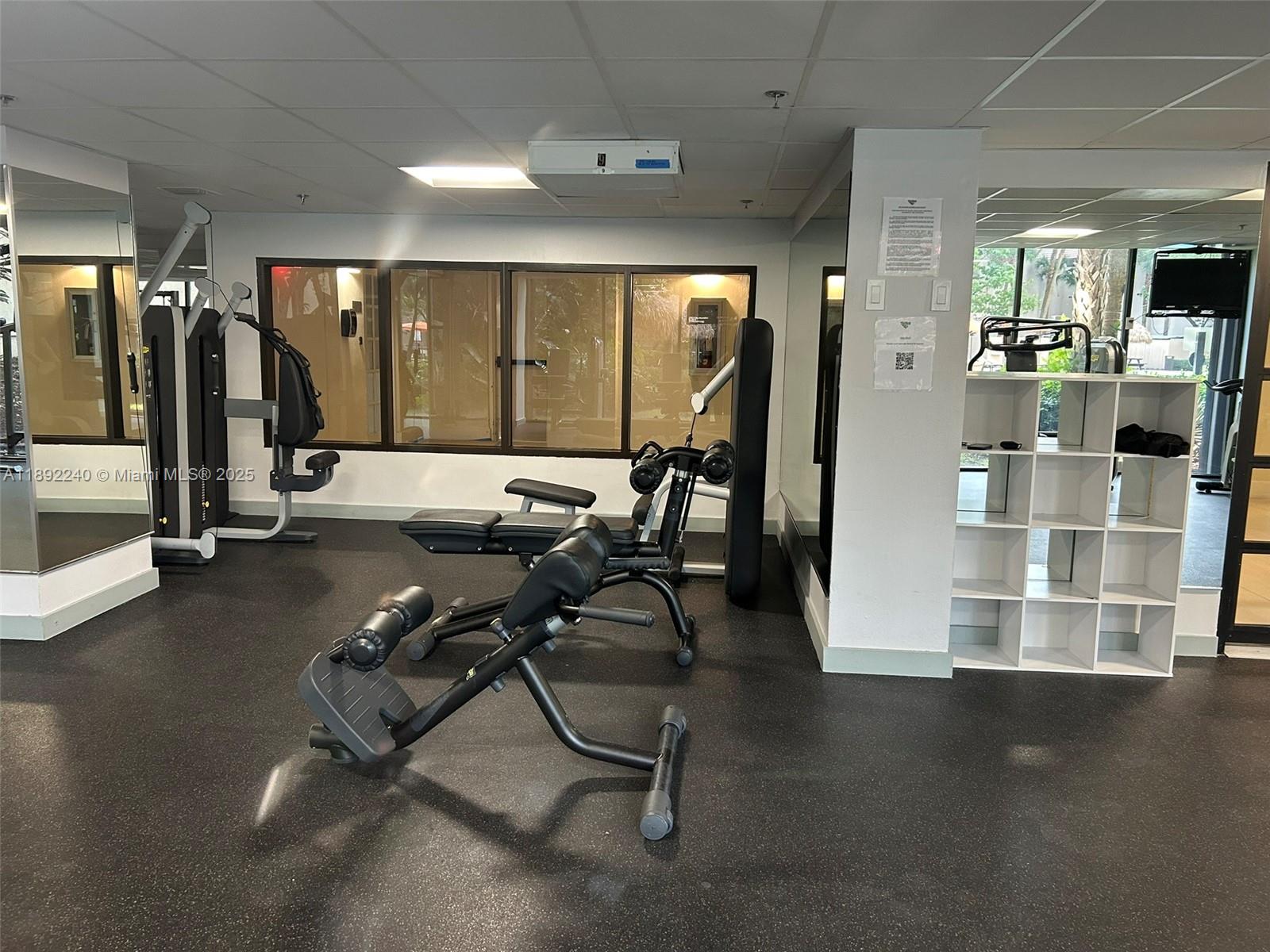 540 Brickell Key Drive, Unit 1602 Miami, FL 33131 - Photo 47 of 61 a view of a room with gym equipment