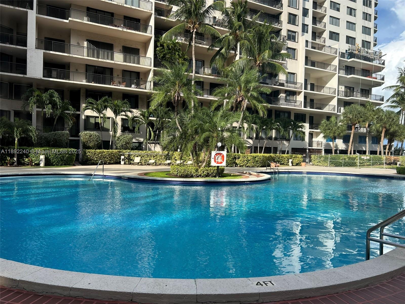 540 Brickell Key Drive, Unit 1602 Miami, FL 33131 - Photo 50 of 61 a view of pool with outdoor seating